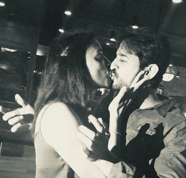 Here's the picture of Hiten-Gauri locking-lips at the birthday bash posted by Hiten on Instagram. (Photo: Instagram)