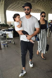SEE PICS: Shahid Kapoor can't take his eyes off BABY Misha at the airport as he leaves for a family vacation with wife & daughter!