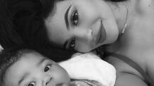 New mommy Kylie Jenner shares a flashback BIKINI snap after sharing adorable pics with her baby girl!