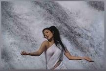 IN PICS: 'Bigg Boss' fame Gizele Thakral recreates the famous Mandakini look in a white sari by the waterfall!