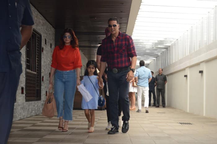 Akshay and Twinlke with kids Nitara-Aarav leave the restaurant post lunch.