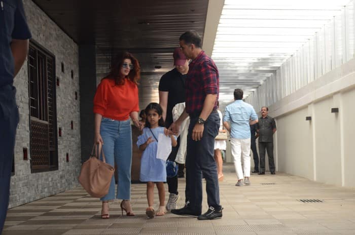 Akshay and Twinlke with kids Nitara-Aarav leave the restaurant post lunch.