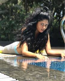 IN PICS: TV actress Kavita Kaushik beats the summer heat by the pool practicing yoga!