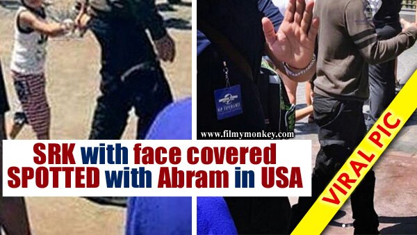 VIRAL PIC: Srk SPOTTED hiding his face while walking with adorable Abram in USA by fans!  VIRAL PIC: Srk SPOTTED hiding his face while walking with adorable Abram in USA by fans!