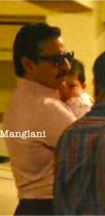 PICS: Taimur Ali Khan sleeps in Dad's arms as Saif & Kareena Kapoor leave for Switzerland!