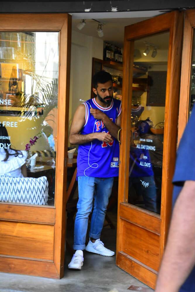 Sonam Kapoor's hubby was snapped in Mumbai today (11th May) by paparazzi for the first time, 3 days after the wedding, outside a restaurant. Check out the pictures here....(Photo: Manav Manglani)