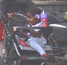 PICS: Sunny Leone's hubby Daniel Weber takes daughter Nisha Kaur Weber out for a walk & it's beyond-Cute!