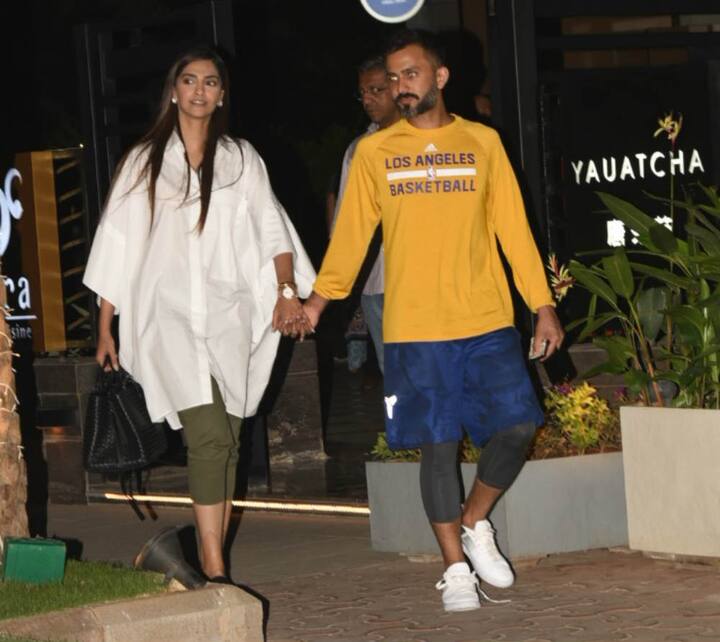 The newly-weds were seen holding hands outside a restaurant in Mumbai. Check out the pictures here...(Photo: Manav Manglani)