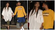 Newlyweds Sonam Kapoor & Anand Ahuja get snapped holding hands on a romantic dinner date!