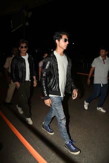 SEE PICS: Shah Rukh Khan and son Aryan twinning in black at the Airport!