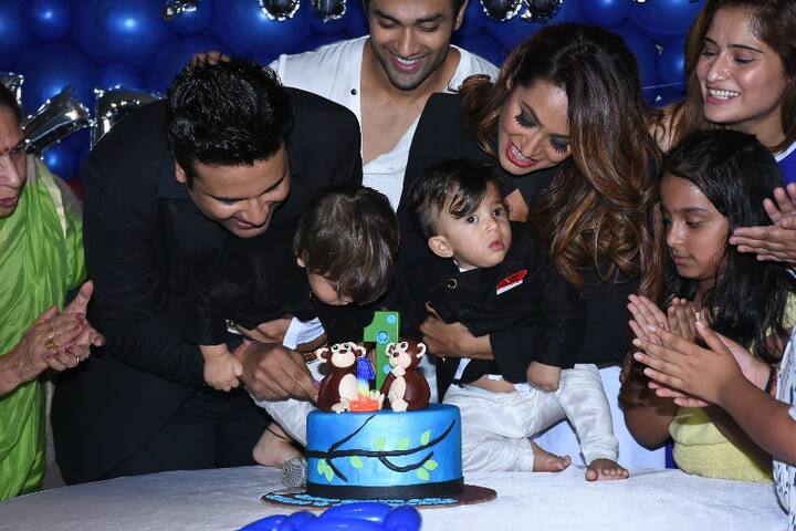 Mommy Kashmera and daddy Krushna cutting the birthday cake