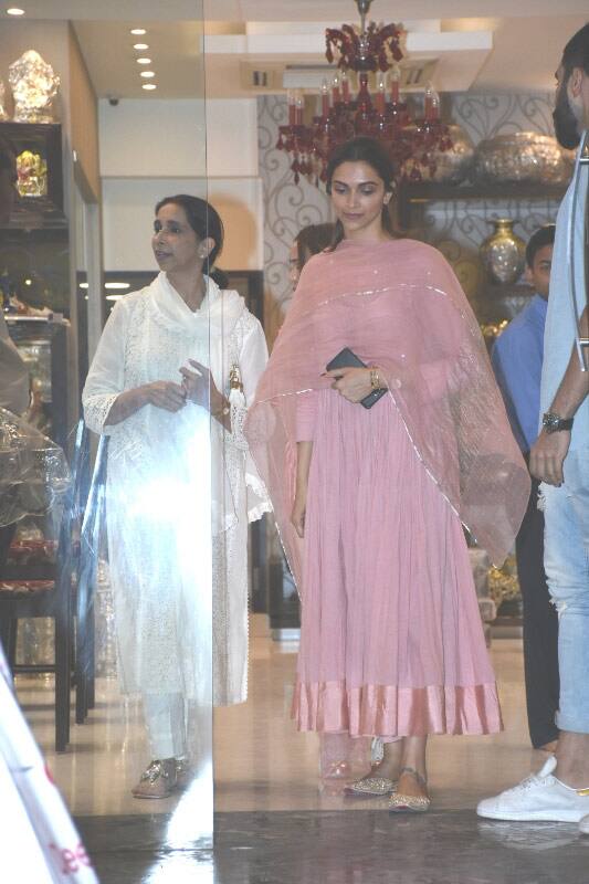 Deepika and mother Ujjala making way out of a Bandra store post shopping here!