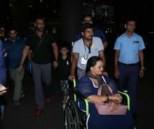 IN PICS: Ajay Devgn spotted with son Yug & mother Veena at the airport!