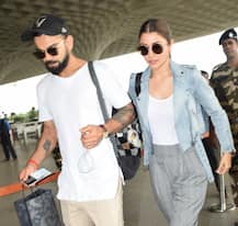 Anushka & Virat get snapped at Airport TWINNING in white sneakers!