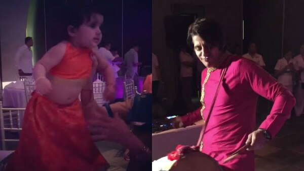 VIDEO & PICS: TV actor Karanvir Bohra playing dhol and his BABY GIRL dancing at a wedding is the CUTEST thing you will see today! VIDEO & PICS: TV actor Karanvir Bohra playing dhol and his BABY GIRL dancing at a wedding is the CUTEST thing you will see today!