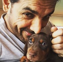 PICS! John Abraham takes adopted stray dog 'Bailey' to veterinary clinic!