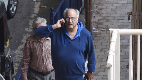 Boney Kapoor was dressed in a blue hoodie with matching jogging pants.