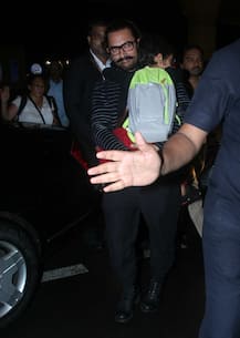 IN PICS: Aamir Khan carrying his sleepy son Azad Rao Khan at the airport!