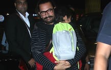IN PICS: Aamir Khan carrying his sleepy son Azad Rao Khan at the airport!