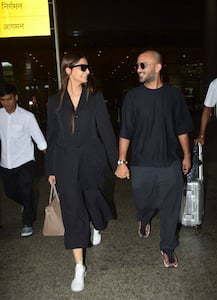 IN PICS: Sonam Kapoor and Anand Ahuja spotted at the airport walking hand-in-hand & twinning in black!