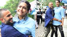 Anand Ahuja picks wife Sonam Kapoor up in his arms posing at his store Veg Non Veg launch! Pics!