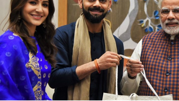 Virat Kohli, Anushka Sharma meet PM Modi Virat Kohli, Anushka Sharma meet PM Modi