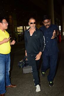 SEE PICS: Akshay Kumar & family back from their vacation; son Aarav avoids paparazzi while daughter Nitara gets playful at the airport!
