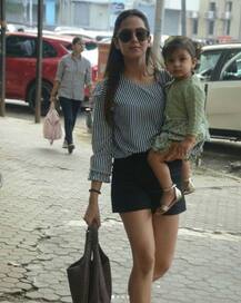 SEE PICS: Shahid Kapoor's wife Mira Rajput looks every bit of a YUMMY-MUMMY as she steps out in style with Baby Misha in arms!