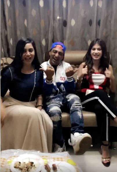 We just showed you a video of evicted contestants Akash Dadlani, Bandgi Kalra and Arshi Khan partying post Akash's eviction and singing his favorite Bang-bang rap song with him and now we bring to you more pictures from this reunion that tell that his female co-contestants were visiting him at his home and bonded beautifully with his family.