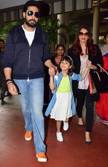 Cute PICS: Aaradhya Bachchan holding Mom-Dad's hand at airport as family arrives back from Australia!