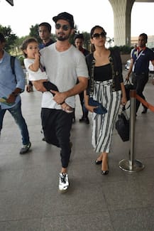 SEE PICS: Shahid Kapoor can't take his eyes off BABY Misha at the airport as he leaves for a family vacation with wife & daughter!