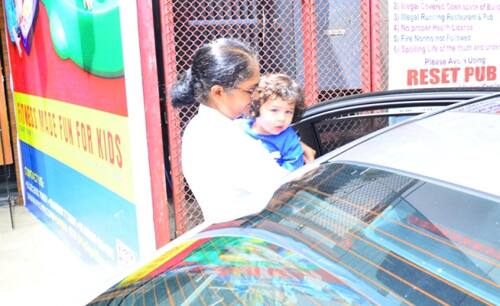 Taimur Ali Khan's spottings outside his playschool mostly in his Nanny's arms has become a daily routine for us but there's always something about this little 'Nawab' that's differently cute. This time his expressions are stuck on his face as he looks at cameras with bewilderment! 