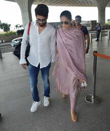 Shahid Kapoor's wife Mira Rajput flaunts her BABY BUMP as they get snapped at the airport!