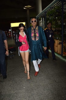PHOTOS: Doting Daddy Boney Kapoor at the airport to receive his STYLISH daughter Khushi!