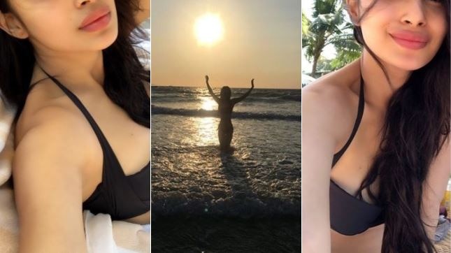 IN PICS: 'Naagin' actress Mouni Roy looks sultry posing in a black bikini at the beach! IN PICS: 'Naagin' actress Mouni Roy looks sultry posing in a black bikini at the beach!