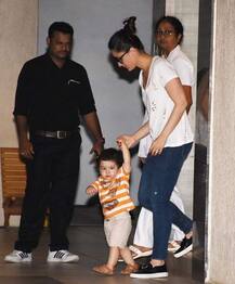 IN PICS: Kareena Kapoor Khan and her sleeping BABY Taimur clicked at the airport as they leave for London for family vacation!