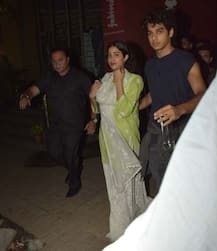 IN PICS: Ishaan Khatter escorts Janhvi Kapoor to car protecting her from CRAZY FANS post their MOVIE DATE!