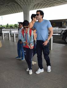 IN PICS: Bobby Deol posing with 'camera shy' son Aryamaan at the airport as the Deol family heads to London