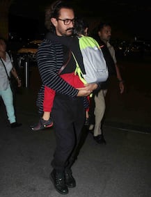 IN PICS: Aamir Khan carrying his sleepy son Azad Rao Khan at the airport!