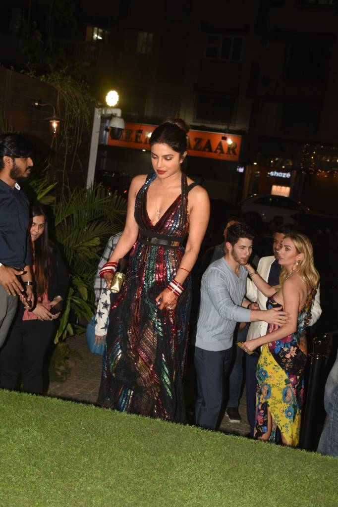 PICS: Priyanka Chopra stuns in a shimmery outfit as she attends an app launch event with hubby Nick Jonas!