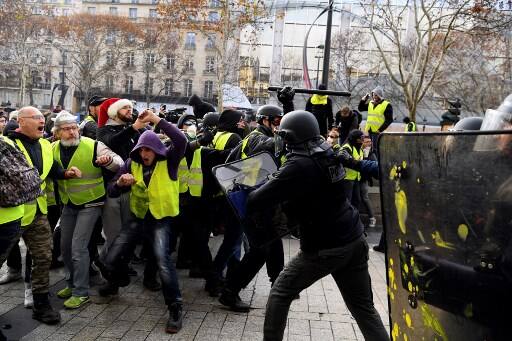 Police in Paris said they made 1,082 arrests on Saturday, up sharply from 412 in the previous round. /AFP IMAGE