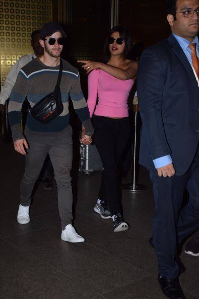 Piggy Chops and the ‘Right Now’ singer have arrived in Mumbai and they were spotted at the airport by the shutterbugs. (Source- Manav Manglani)