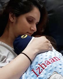 Sania Mirza spotted with her newborn son Ishaan Mirza Malik hiding him under cute bear onesie at the airport!
