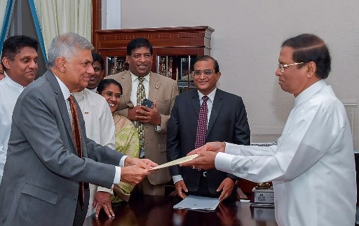 Sri Lanka cabinet appointed by Sirisena after political crisis; power tussle with Wickremesinghe not over yet Sri Lanka cabinet appointed by Sirisena after political crisis; power tussle not over yet