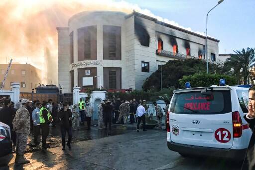Afterwards, a group of gunmen entered the building from the front and back entrances and exchanged heavy fire with the security forces, the official added. One of the killed was an employee of the Ministry. (Photo by Mahmud TURKIA / AFP)