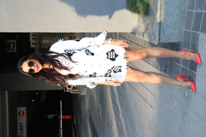 Deepika Padukone at Facebook office looking hot in white denim dress in Mumbai this morning.