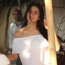 Sara Ali Khan spotted at gym looking fresh like dew in white off-shoulder crop top, lacy shorts and wet hair!