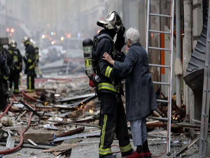 Images posted on Twitter showed debris covering the street and the lower part of the building blown out and in flames. / AFP IMAGE
