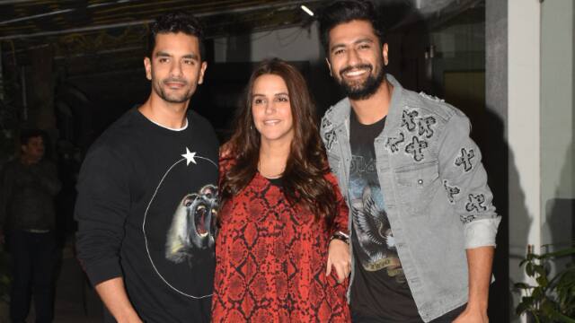 Bollywood couple Neha Dhupia and Angad Bedi also attended the film’s screening and they posed with Vicky Kaushal for the paparazzi.