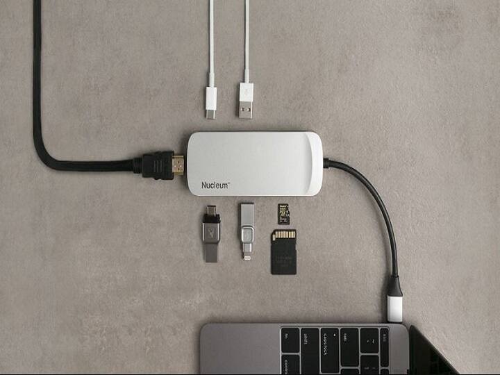 A single USB-C hub can help you to connect up to 7 devices at once. The Nucleum has you covered whether you want to connect to a larger monitor or need to offload footage from the latest photo shoot. With the Nucleum you can power up your Apple MacBook1 while also connecting to a USB Flash drive and charging an iPhone1. The compact size and built-in cable also make the Nucleum a perfect travel companion to take with you on location. USB-C hub is available for approx Rs 3,500 in India.